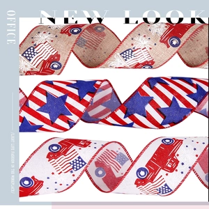 Detailed close-up of Independence Day themed ribbons with vintage truck and flag patterns