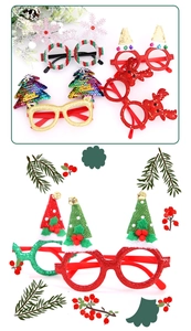 Detail of Christmas glasses frames with glitter reindeer antlers and holiday sequins