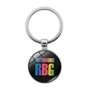 Macro shot of silver keyring with Notorious RBG text in rainbow colors on black base