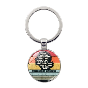 Silver Ruth Bader Ginsburg keychain featuring RBG portrait and inspirational quote