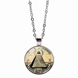 Detailed close-up of a silver steampunk necklace with eye of providence and pyramid