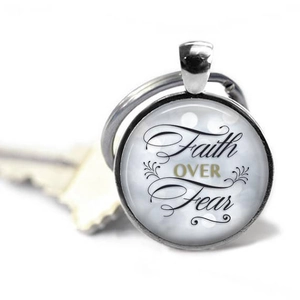 Silver round faith over fear keychain with glass dome and elegant scrollwork decor