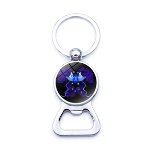 Detail of Gemini zodiac beer bottle opener keychain with cartoon resin glass cabochon