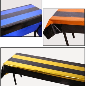 Striped disposable plastic tablecloths for Halloween party decor in black, orange and blue