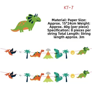 Detail of dinosaur party garland featuring paper volcanoes and cartoon dinosaurs on 3M string