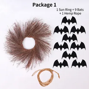 Close-up of Halloween twig wreath set with black paper bats and natural hemp rope