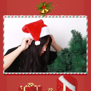 Classic red plush Christmas hat with white faux fur trim and pompom for festive parties