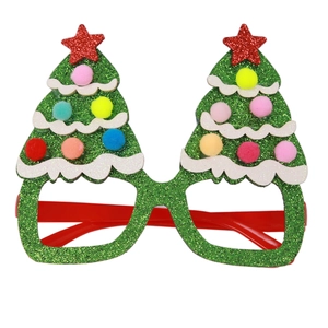 Green glitter Christmas tree glasses with mini pom poms and red stars for party decor