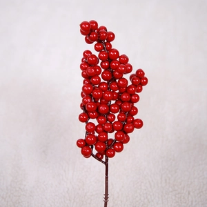 Artificial red berry branch for Christmas home decor and DIY flower arrangements