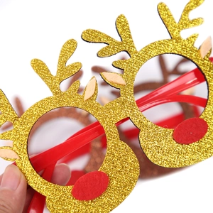 Glittery gold reindeer antler Christmas glasses for kids party decorations and dress-up