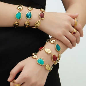18k gold plated stainless steel bracelet with colorful teardrop resin stones on model