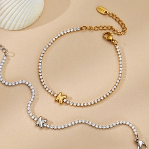 Sparkling pavé zircon tennis bracelet with initial K in 18k gold plated stainless steel
