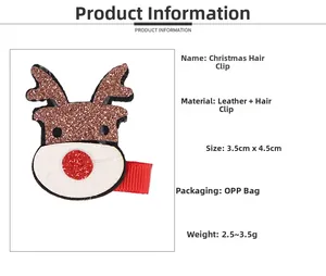 Detail of Christmas reindeer hair clip with brown glitter finish and red ribbon wrap