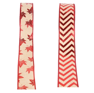 Detail of red maple leaf and chevron patterns on woven burlap Christmas ribbons