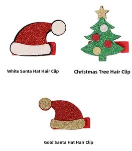 Detail of Christmas tree and Santa hat hair clips with glitter finish and red ribbon clips