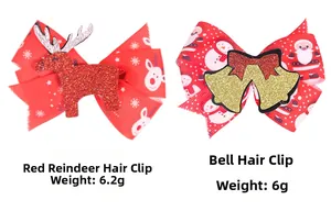 Detail of Christmas bow hair clips featuring glitter reindeer and golden bell ornaments