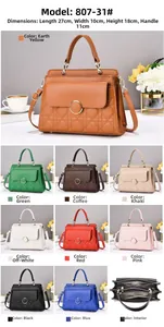 Detailed view of quilted leather handbag featuring three-layer interior structure and multi-colors