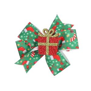 Diadema de Navidad con cinta verde estampada y adorno de caja de regalo roja brillante