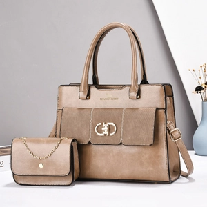 Brown leather handbag and chain envelope bag set with golden hardware details