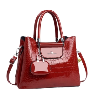 Dark red crocodile pattern glossy handbag with silver hardware and mini charm bag