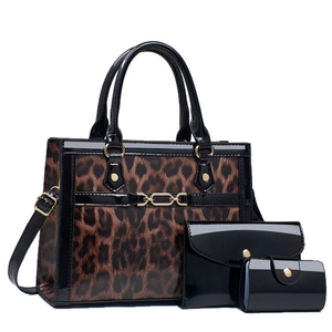 Three-piece leopard print and glossy black leather handbag set with gold chain detail
