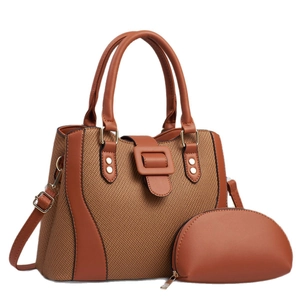 Brown patchwork handbag set with woven texture and matching coin purse on white background