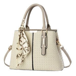 Elegant beige plaid embossed tote bag with top handles and decorative silk scarf