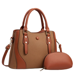 Two-piece set of tan brown patchwork tote and crossbody bag with woven texture details