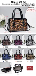 Detailed view of leopard print tote dimensions and internal structure with bottom studs