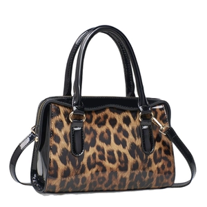 Stylish leopard print handbag in black patent leather trim with gold hardware accents