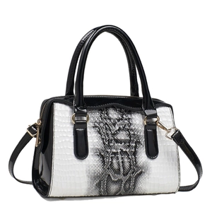 Snake skin pattern Boston handbag with black trim and detachable shoulder strap