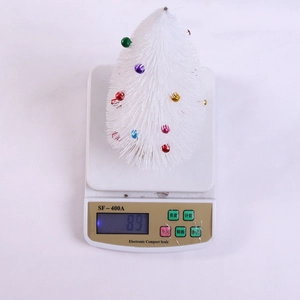 Detailed top view of an 89g mini white Christmas tree with colorful ball ornaments