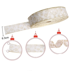 6.3cm white Christmas ribbon with gold glitter snowflakes and sparkling wired edges