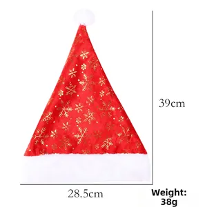 Detail view of red Christmas hat with gold snowflake print and size dimensions 39x28.5cm
