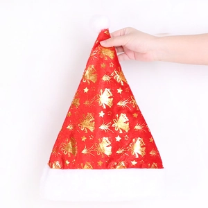 Close-up of red Santa hat featuring gold glitter star and bell prints with white plush trim