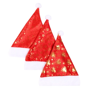 Three red plush Christmas hats with gold foil snowflakes and soft white trim on white background