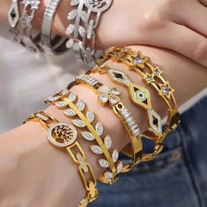 18K gold plated stainless steel bangles set featuring heart and zircon flower charms