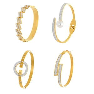 Lot de quatre bracelets en acier inoxydable plaqué or 18 carats avec cristaux de zircon
