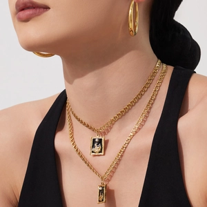 Double-layered 18k gold plated necklace with black enamel square pendants and hoop earrings