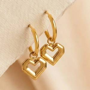 Minimalist 18k gold plated stainless steel heart drop earrings on white paper background