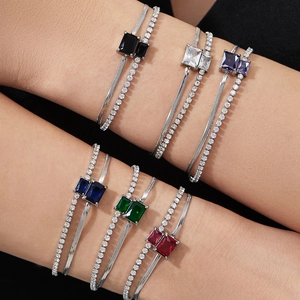 Double-layer stainless steel bracelet with tennis chain and emerald-cut gemstones