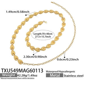 Detail of adjustable golden stainless steel waist chain with textured leaf links