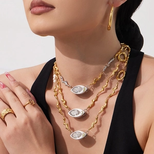 Three-layer layered necklace with marquise zircon, pearls and matching gold jewelry set