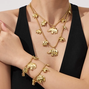 Parure de bijoux pour femme avec pendentif éléphant doré et collier en perles double couche