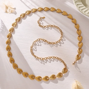 Golden leaf chain belt with vertical texture and adjustable lobster clasp for women