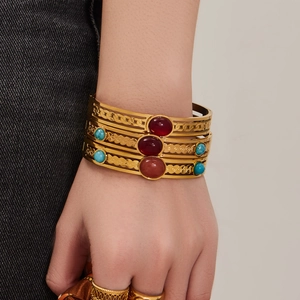 Exotic gold plated stainless steel bangles set with red agate and turquoise stones