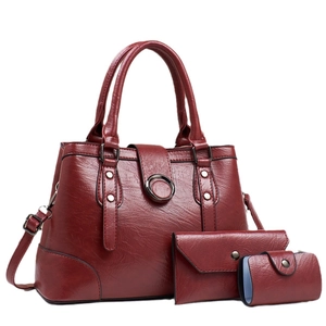 Three-piece burgundy faux leather tote set with crossbody strap and matching wallets