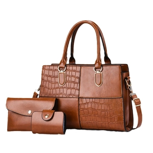 Three-piece brown stone pattern tote bag set with textured leather and gold hardware