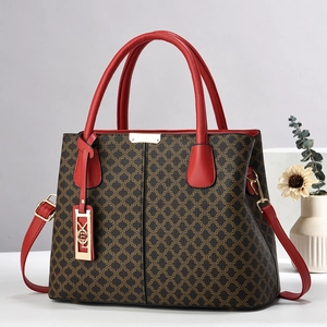 Borsa tote vintage classica con manici in pelle rossa e dettagli in metallo dorato