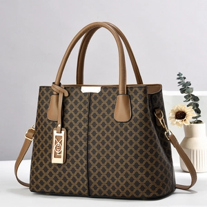 Borsa a mano vintage da donna con manici in pelle marrone e dettagli in metallo dorato
